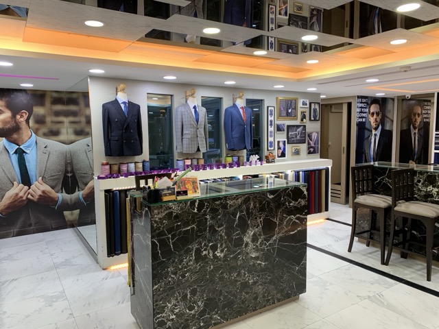 Nana Fashions showroom — suits on display